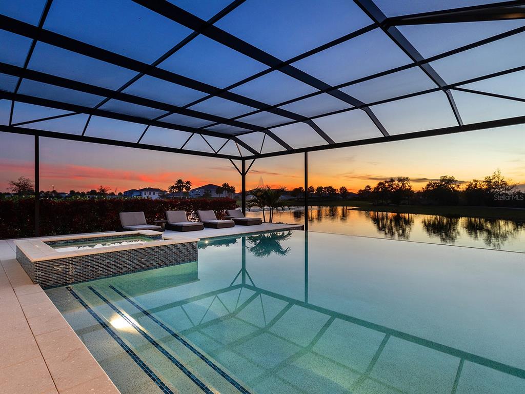 4218 Butte Trail Lakewood Ranch, FL 34211 - Photo 75 of 89 a view of swimming pool with outdoor seating