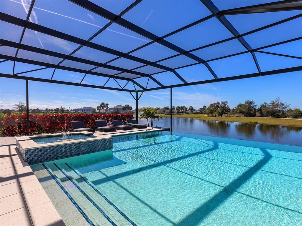 4218 Butte Trail Lakewood Ranch, FL 34211 - Photo 76 of 89 a view of a backyard with sitting area