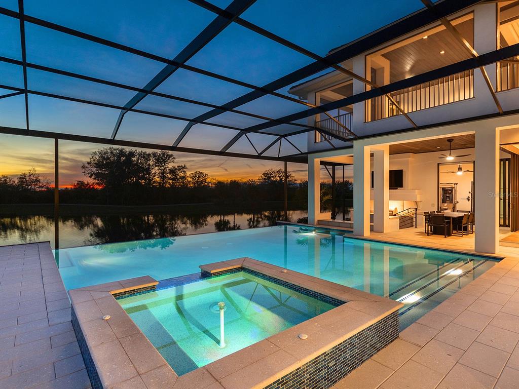 4218 Butte Trail Lakewood Ranch, FL 34211 - Photo 77 of 89 a view of a swimming pool with a patio