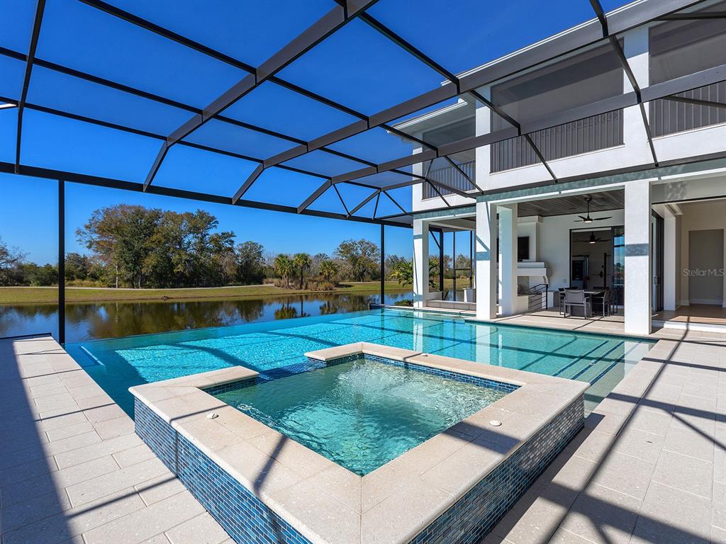4218 Butte Trail Lakewood Ranch, FL 34211 - Photo 78 of 89 a view of a backyard with sitting area