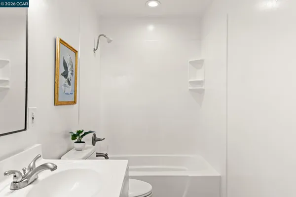 a bathroom with a sink and a bathtub