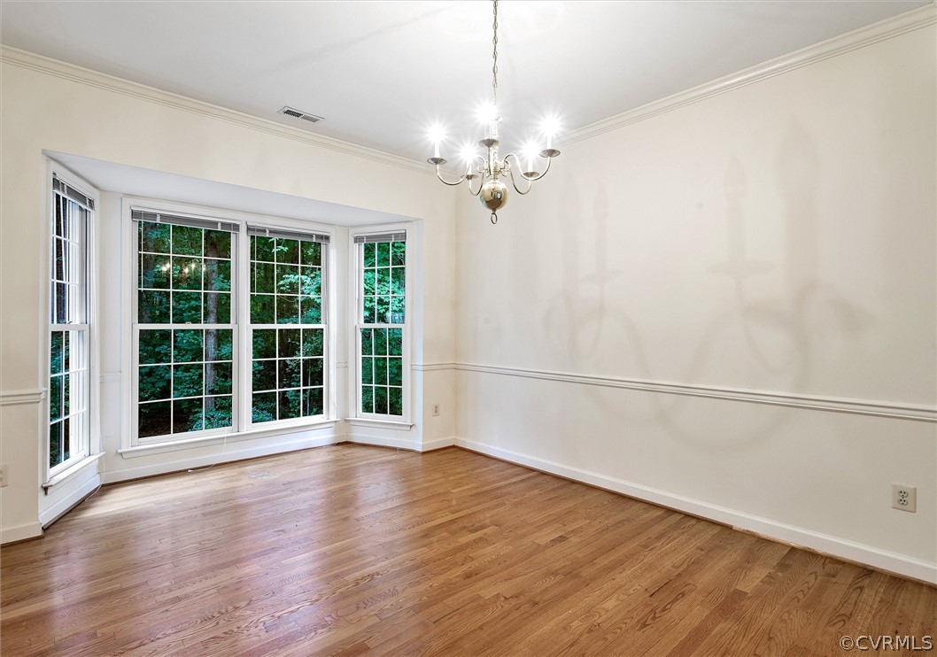 2903 Cove Ridge Road Midlothian, VA 23112 - Photo 13 of 32 an empty room with wooden floor and windows