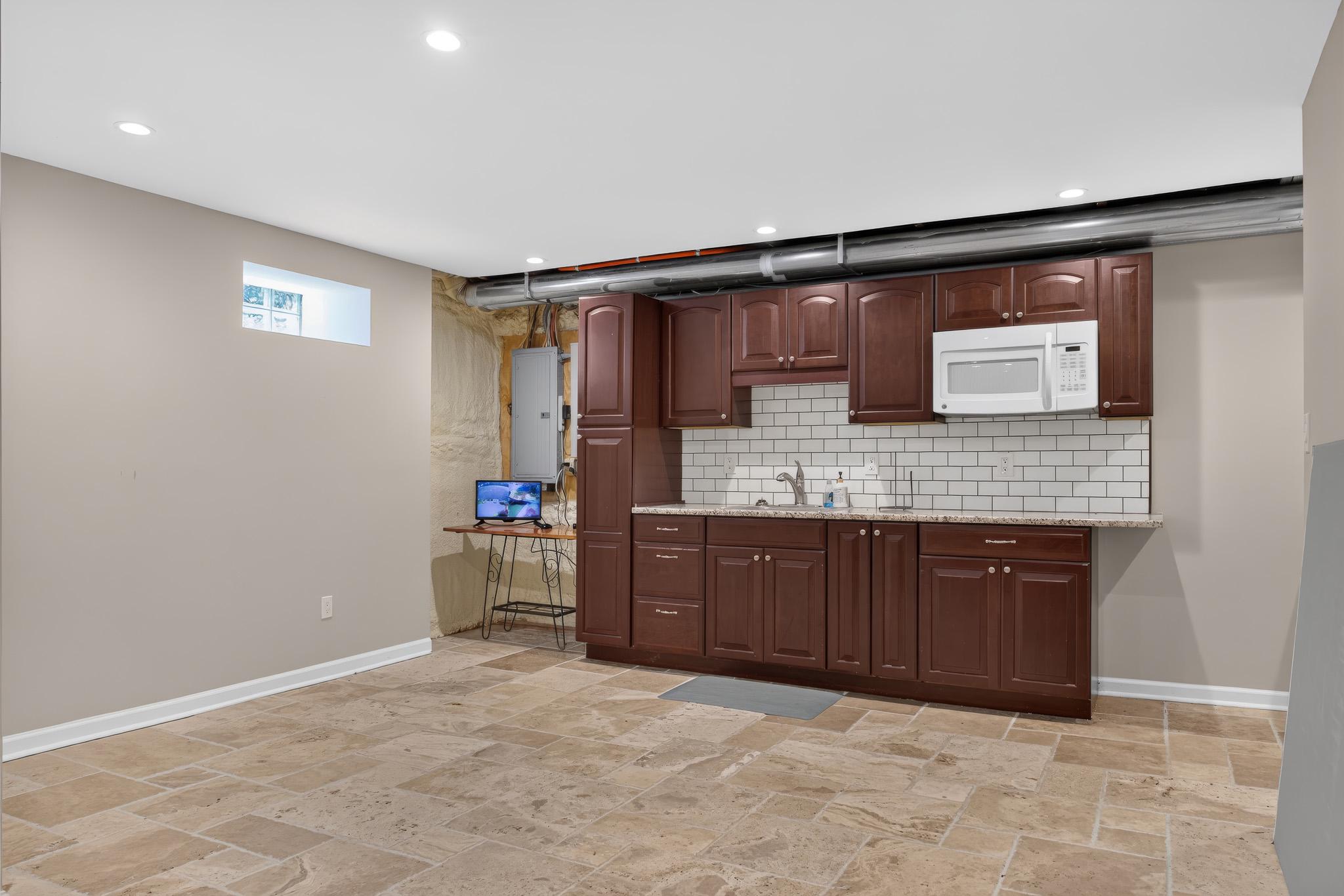 413 Broad Street Perkasie, PA 18944 - Photo 33 of 42 basement kitchenette retreat.