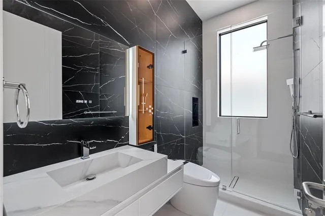 front view of a house with a swimming pool