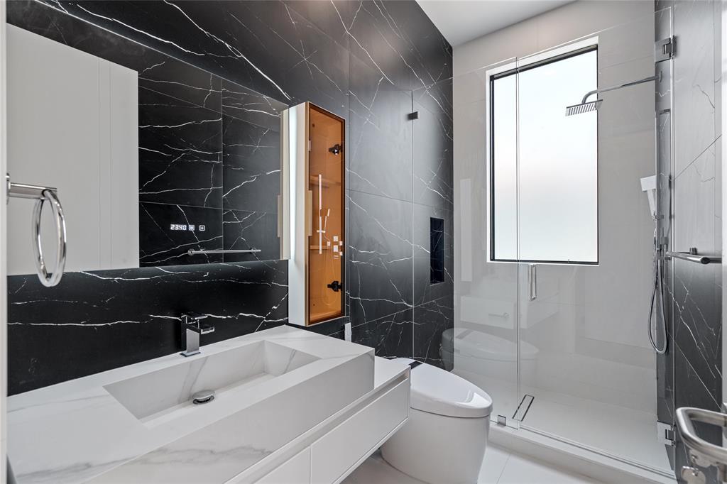 2 Sunset Lane Lauderdale-by-the-Sea, FL 33062 - Photo 27 of 79 a bathroom with a sink a toilet and shower