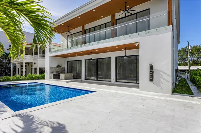 a view of a chairs and table in a patio