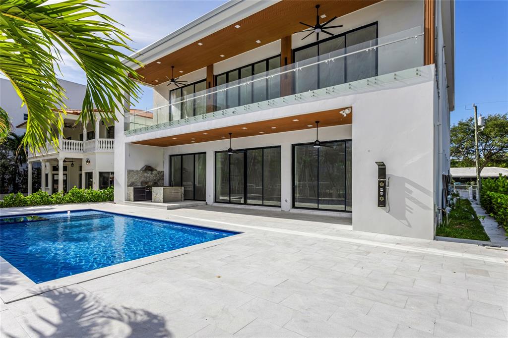 2 Sunset Lane Lauderdale-by-the-Sea, FL 33062 - Photo 38 of 79 a view of a house with a swimming pool