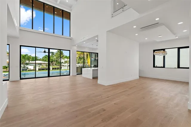 wooden floor in a hall with a window