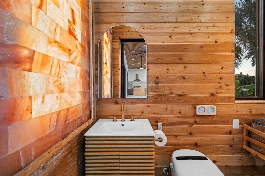 2 Sunset Lane Lauderdale-by-the-Sea, FL 33062 - Photo 43 of 79 a bathroom with a sink a toilet and shower curtain