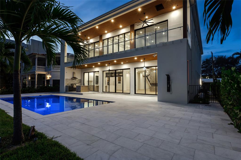2 Sunset Lane Lauderdale-by-the-Sea, FL 33062 - Photo 46 of 79 a view of a house with swimming pool and sitting area