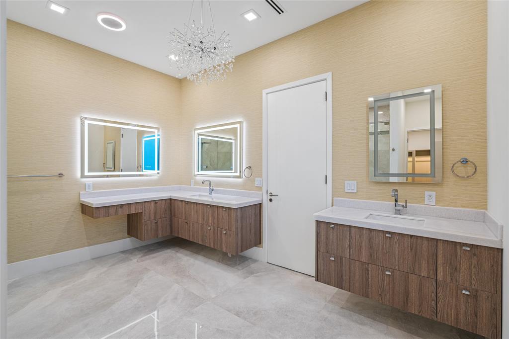 2 Sunset Lane Lauderdale-by-the-Sea, FL 33062 - Photo 64 of 79 a bathroom with a double vanity sink mirror and bathtub