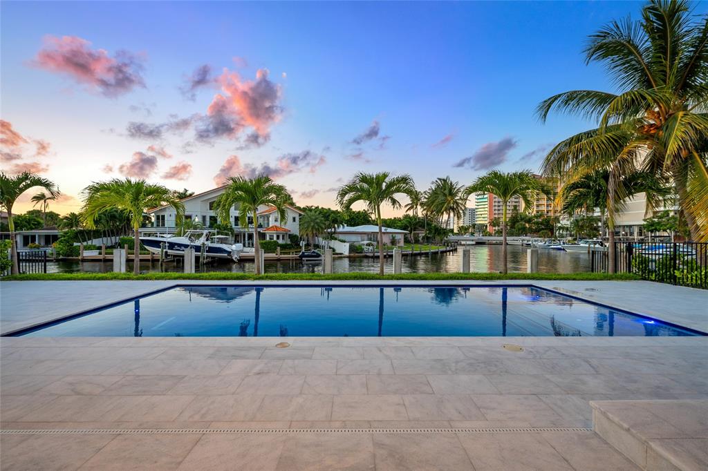 2 Sunset Lane Lauderdale-by-the-Sea, FL 33062 - Photo 68 of 79 a view of swimming pool with outdoor seating