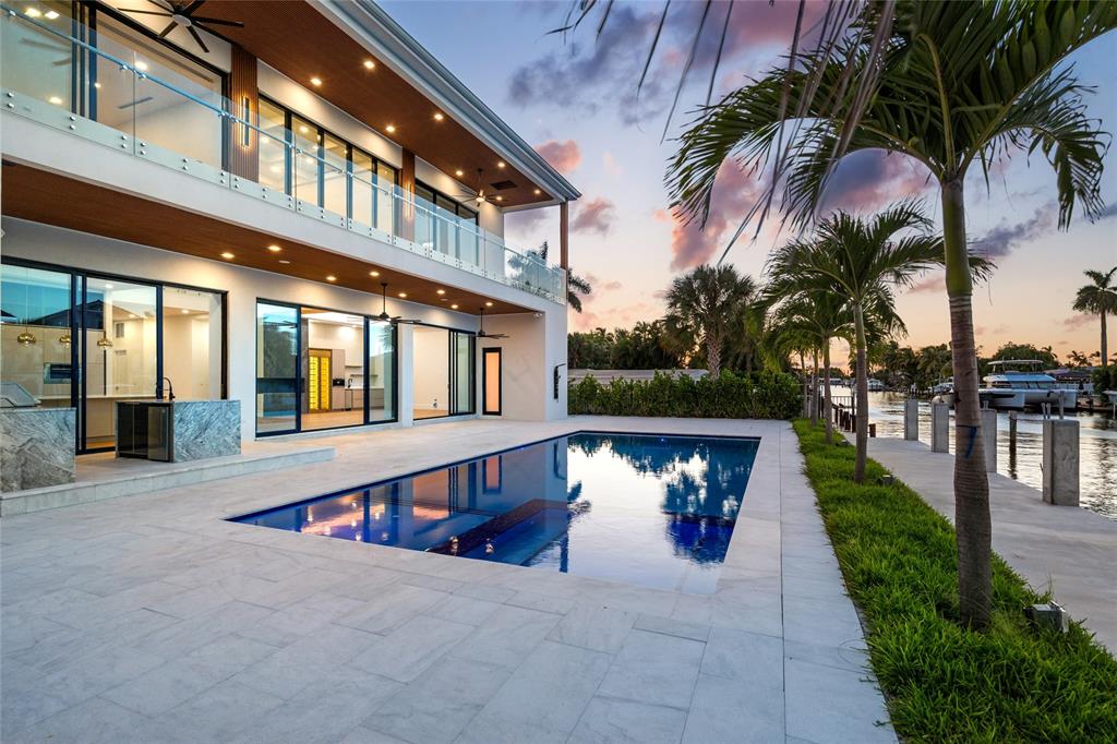 2 Sunset Lane Lauderdale-by-the-Sea, FL 33062 - Photo 70 of 79 a view of a building with a yard