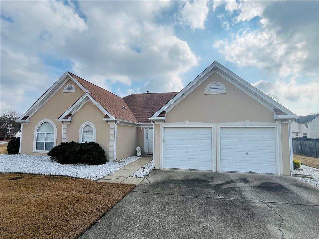 a house view with a outdoor space