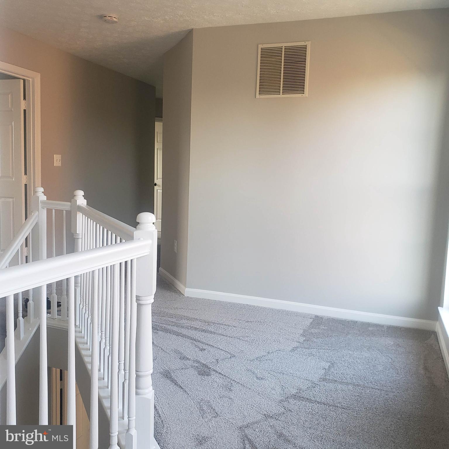 607 Hunting Ridge Drive Frederick, MD 21703 - Photo 18 of 61 Second level hallway area
