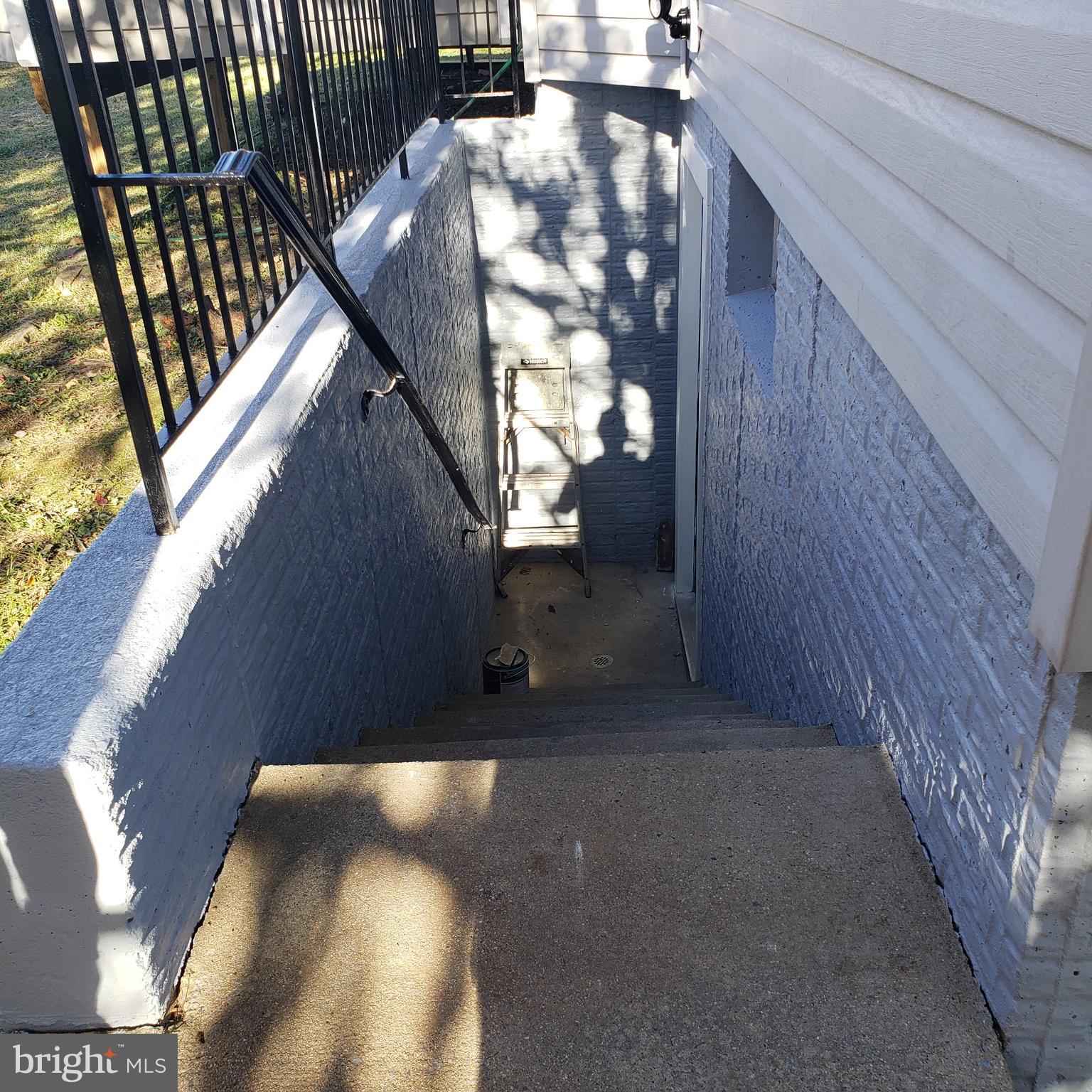 607 Hunting Ridge Drive Frederick, MD 21703 - Photo 43 of 61 Basement Entry/Exit door & stairs