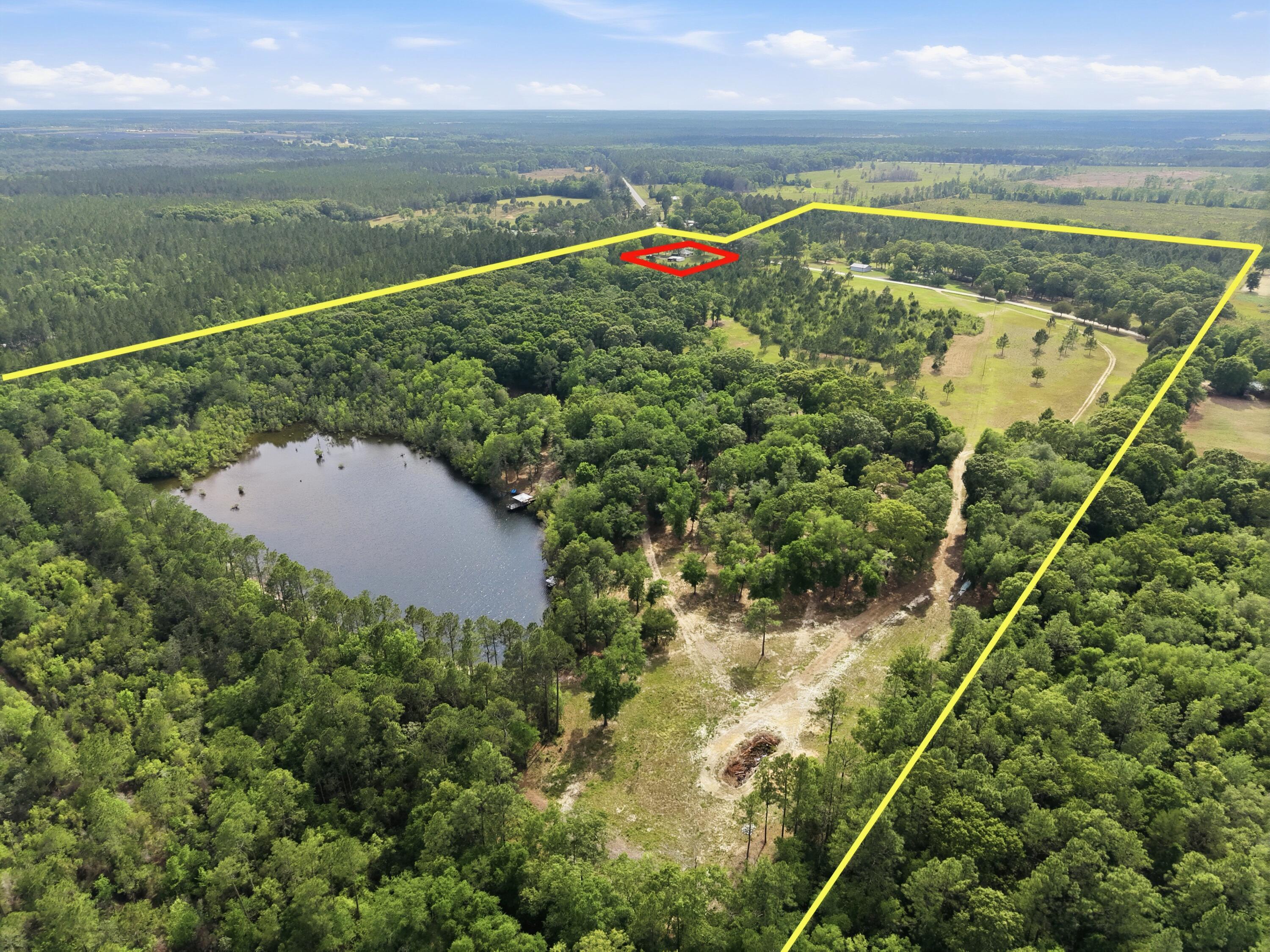 261 Wilkerson Road DeFuniak Springs, FL 32433 - Photo 12 of 76 a view of an ocean and beach