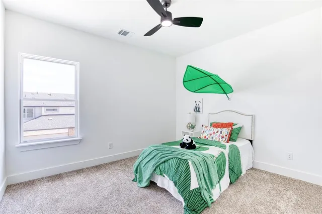 a bathroom with a shower and a sink