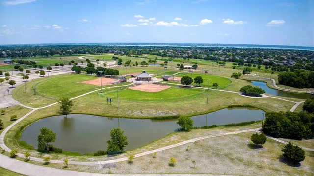 a view of a swimming pool with a balcony
