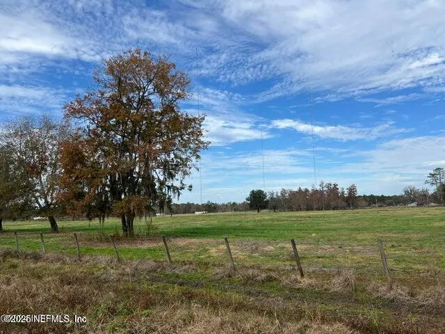 a view of a golf course with a yard