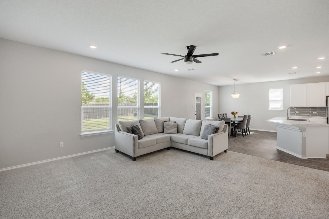 214 Saranac Drive Elgin, TX 78621 - Photo 19 of 37 a living room with furniture and a large window