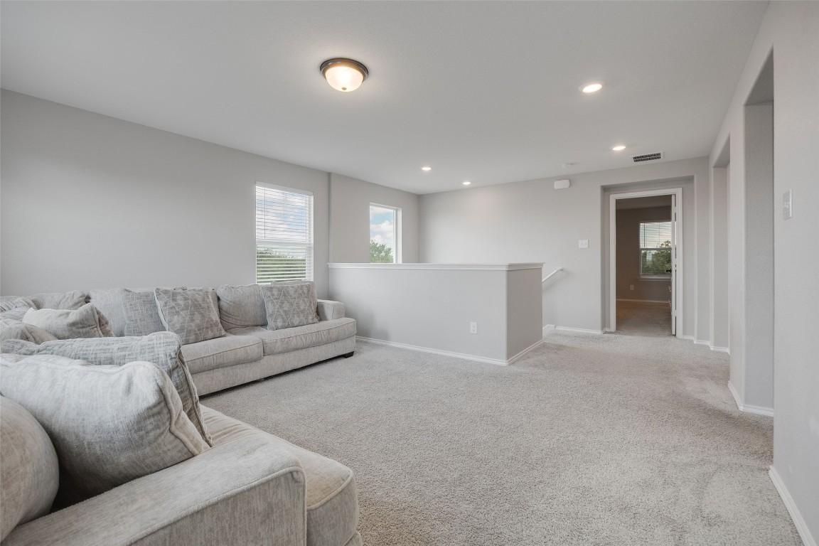 214 Saranac Drive Elgin, TX 78621 - Photo 20 of 37 a living room with furniture and a large window