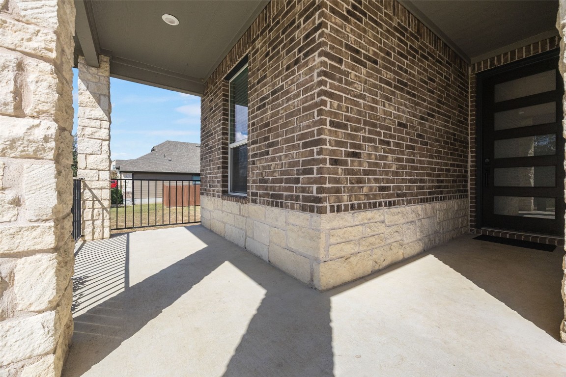 214 Saranac Drive Elgin, TX 78621 - Photo 37 of 37 a view of balcony with a potted plant