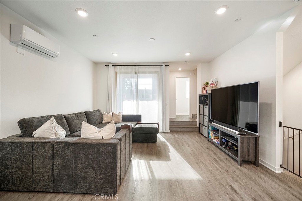 229 Scratch Road Covina, CA 91722 - Photo 14 of 29 a living room with furniture and a flat screen tv