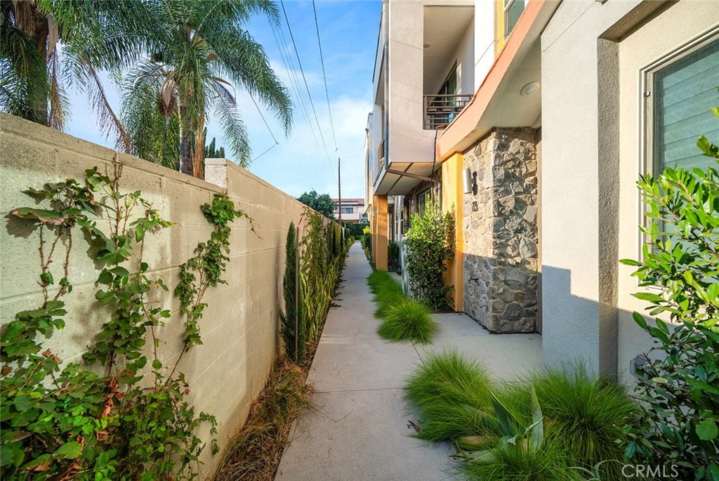 229 Scratch Road Covina, CA 91722 - Photo 3 of 29 a view of path along with house and trees in outdoor background