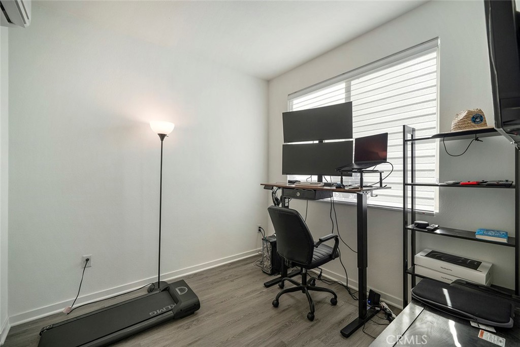 229 Scratch Road Covina, CA 91722 - Photo 5 of 29 a view of a workspace with furniture and a window