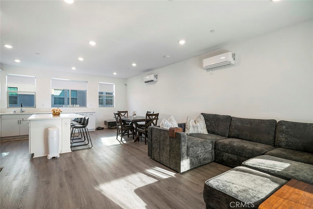 229 Scratch Road Covina, CA 91722 - Photo 9 of 29 a living room with furniture and a wooden floor
