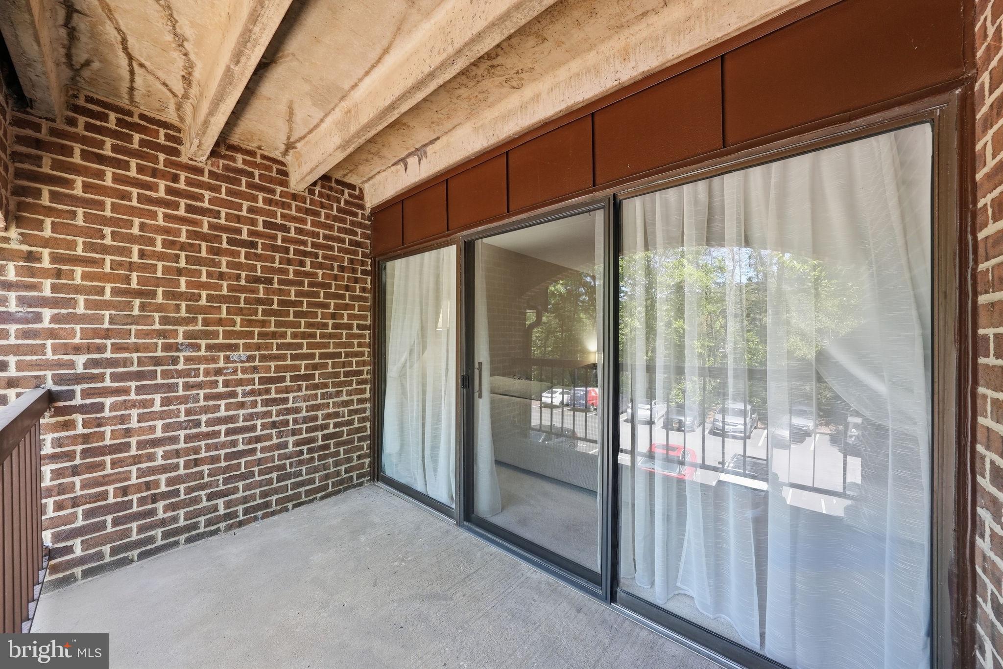 11252 Chestnut Grove Square, Unit 248 Reston, VA 20190 - Photo 19 of 25 Spacious balcony with serene views.