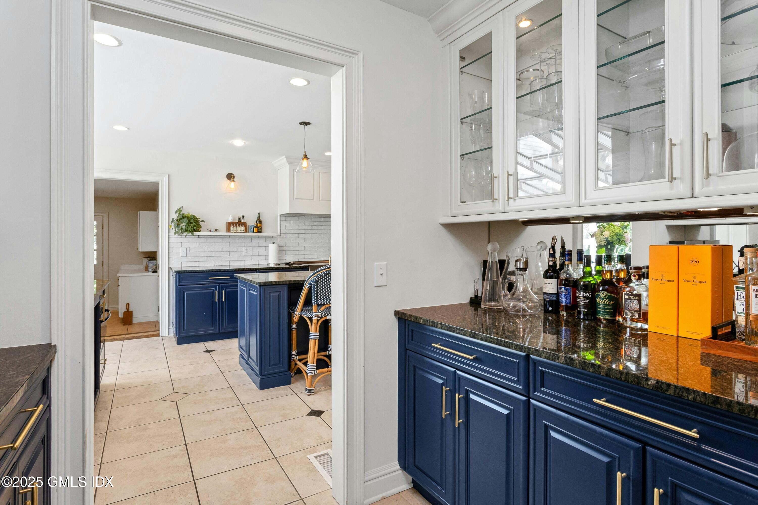 40 Willowmere Circle Riverside, CT 06878 - Photo 11 of 34 a kitchen with stainless steel appliances granite countertop a sink and cabinets