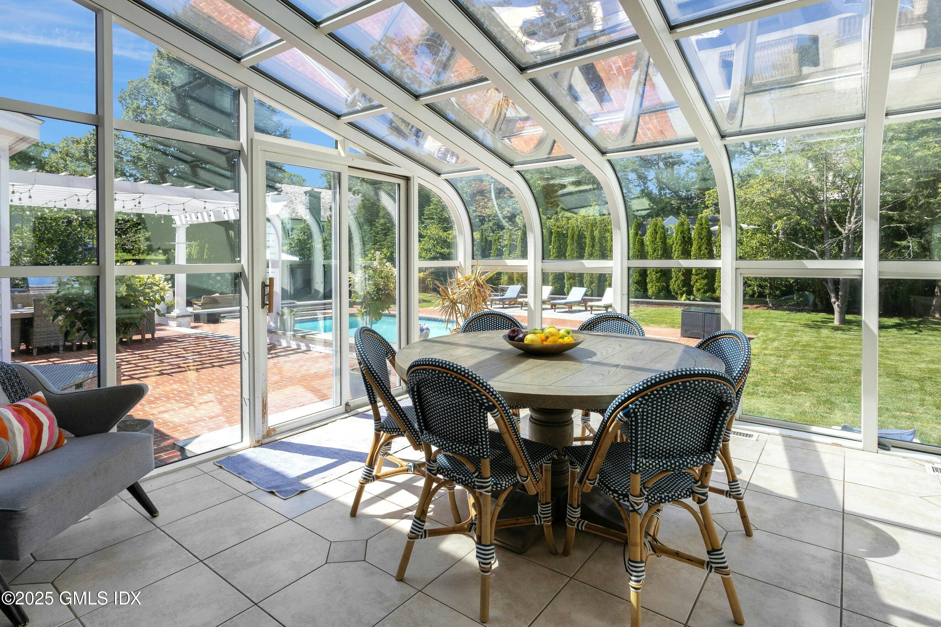 40 Willowmere Circle Riverside, CT 06878 - Photo 14 of 34 a view of a dining room with furniture window and outside view