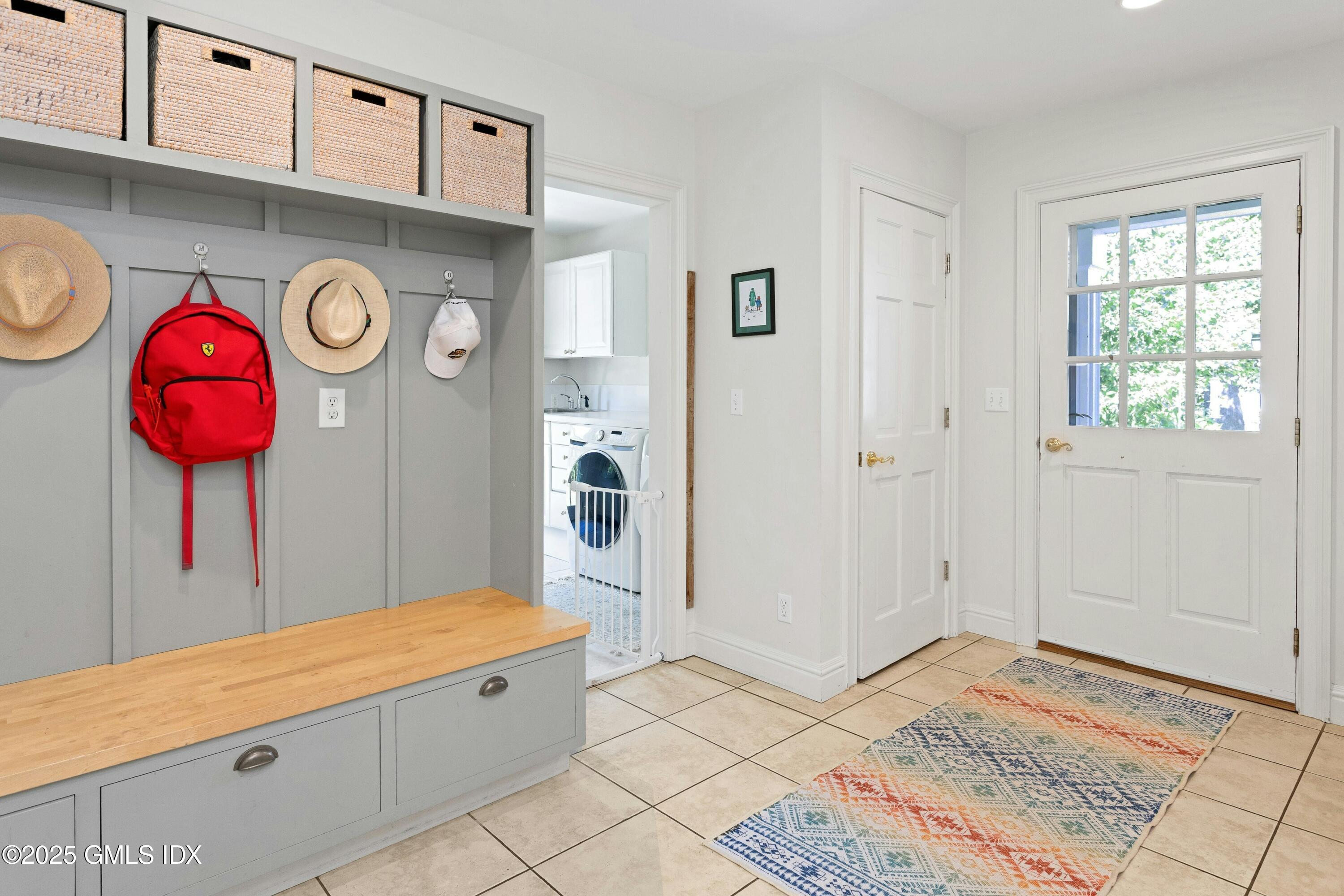 40 Willowmere Circle Riverside, CT 06878 - Photo 16 of 34 a view of an entryway with kitchen cabinetry and window