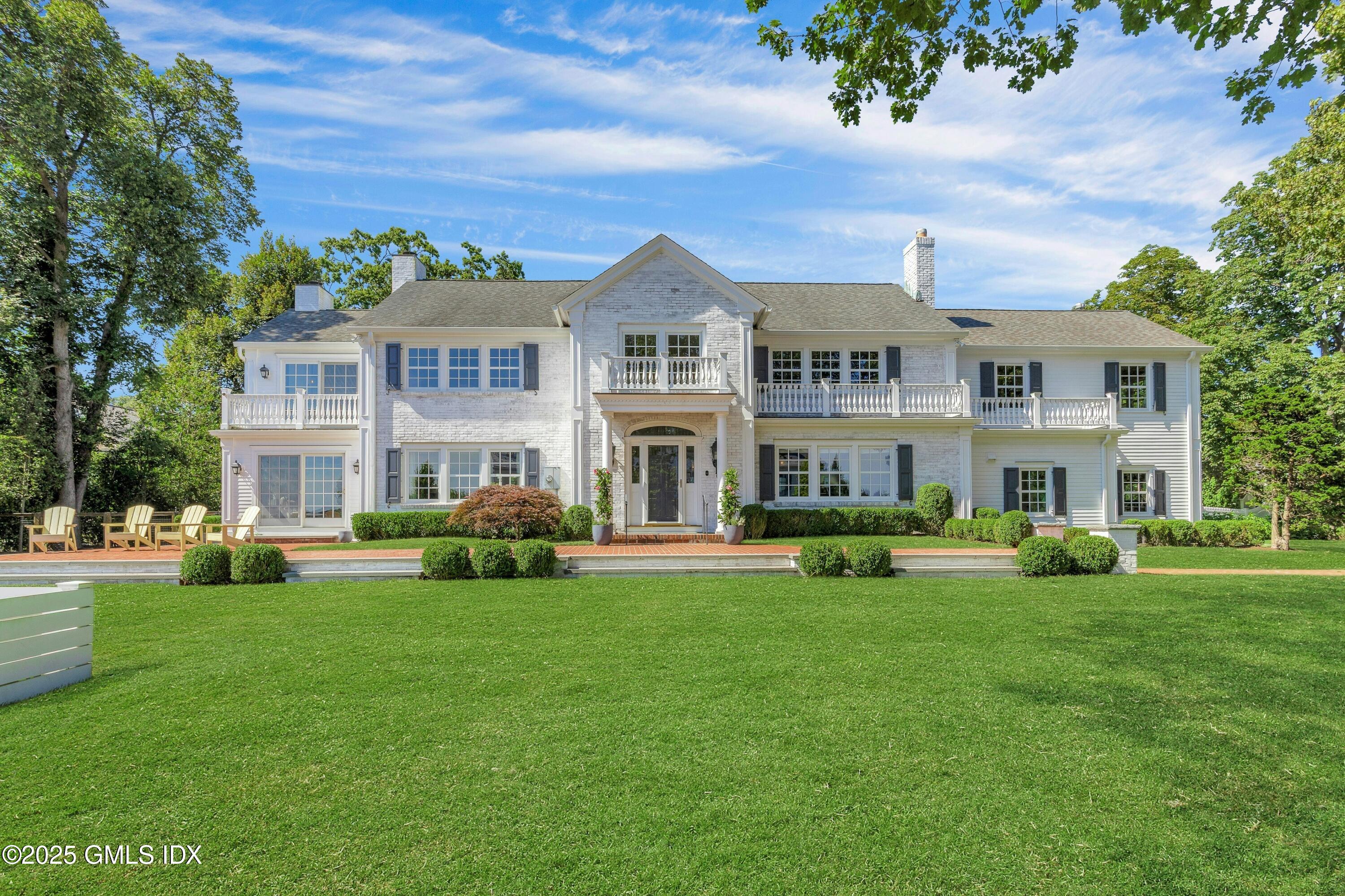 40 Willowmere Circle Riverside, CT 06878 - Photo 2 of 34 a front view of house with yard and green space