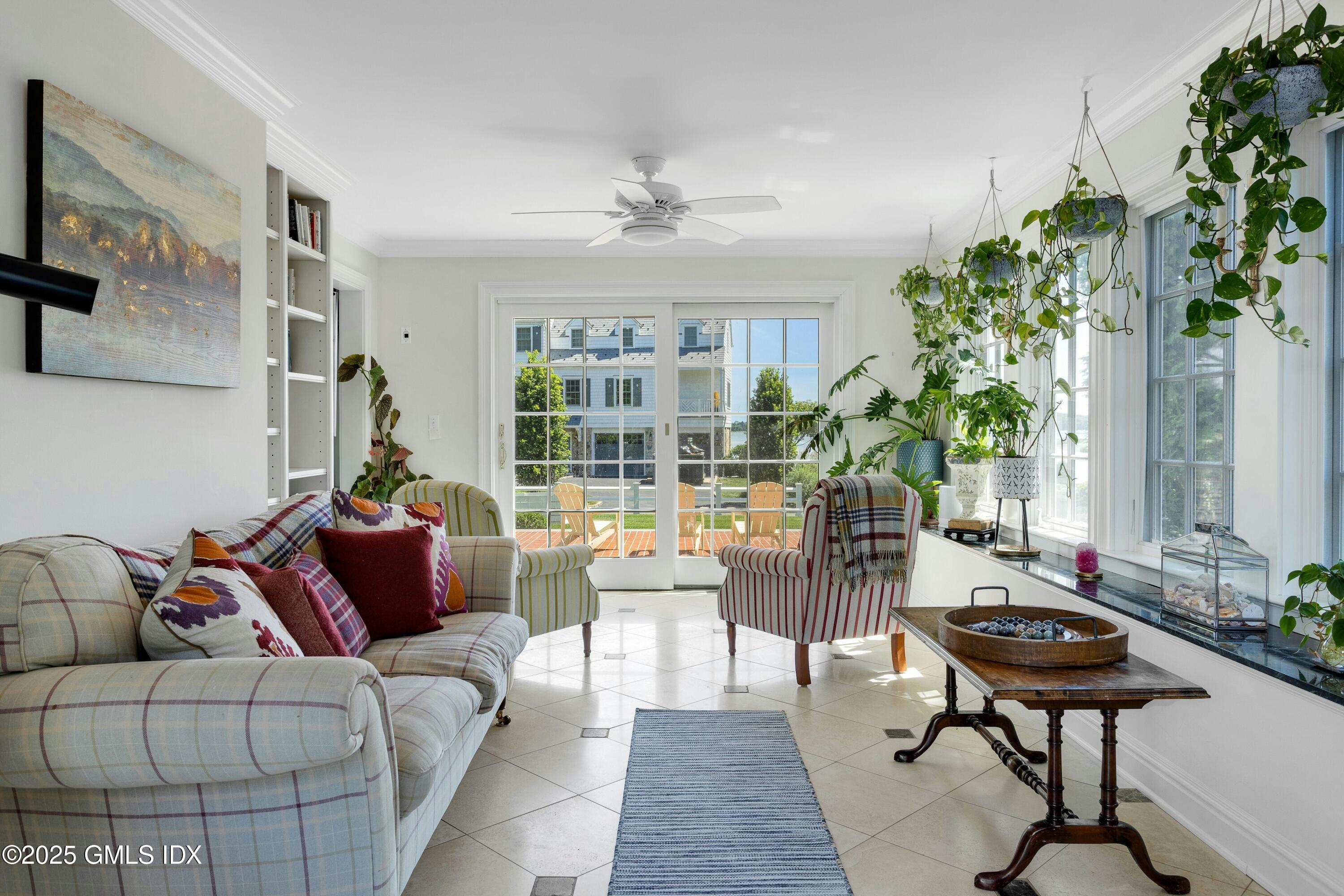 40 Willowmere Circle Riverside, CT 06878 - Photo 8 of 34 a living room with furniture a table and a potted plant