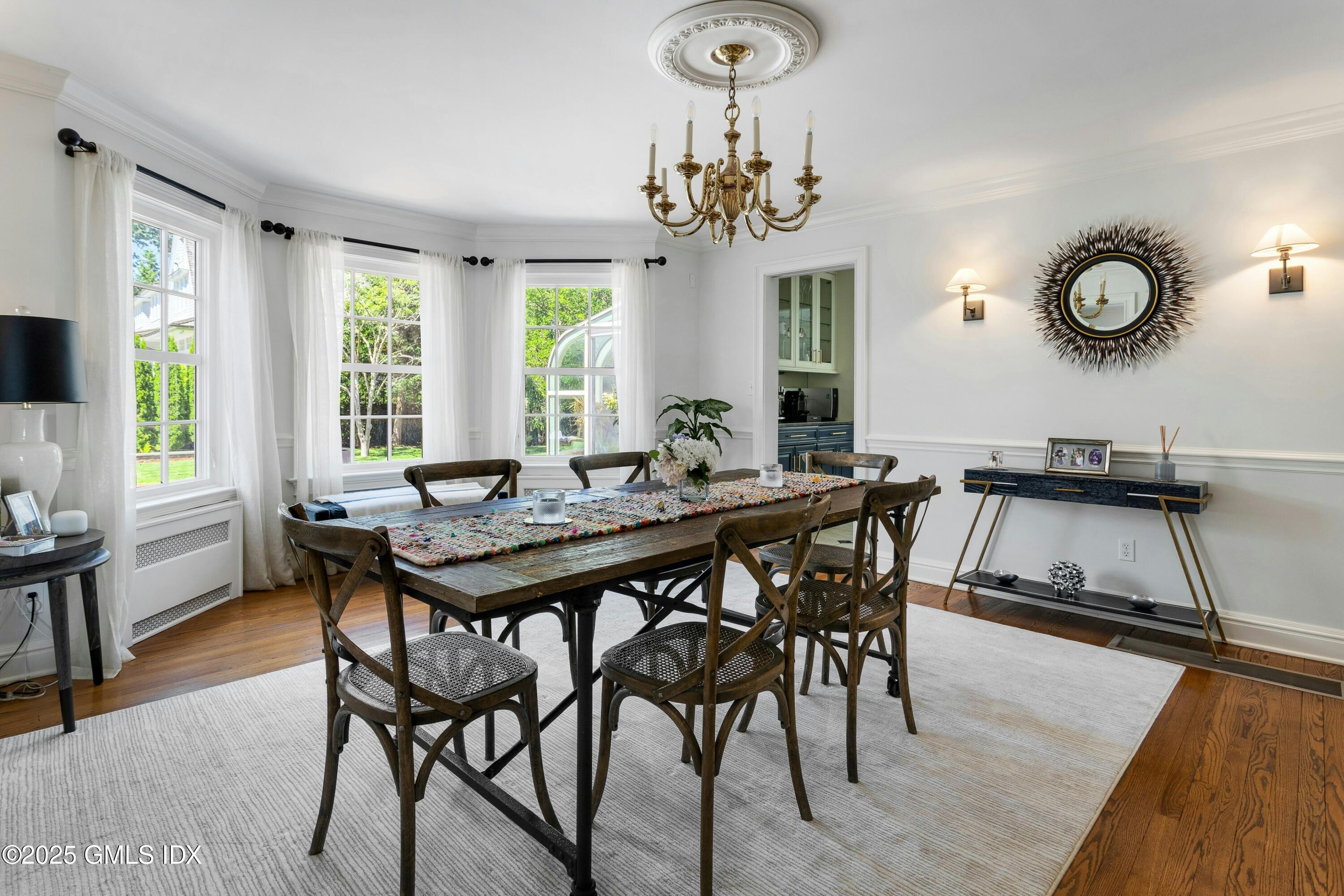 40 Willowmere Circle Riverside, CT 06878 - Photo 10 of 34 a view of a dining room with furniture window and wooden floor