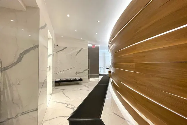 a view of city with tall buildings