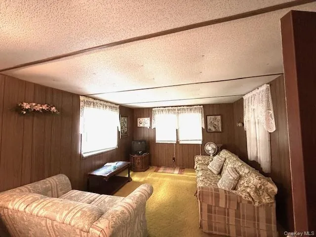 a bedroom with bed and window