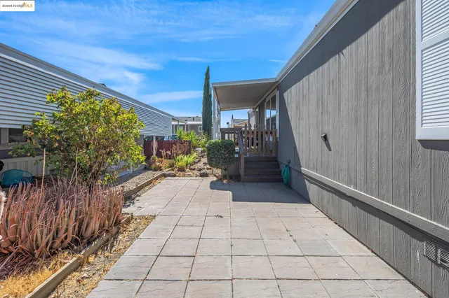 a house with trees in the background