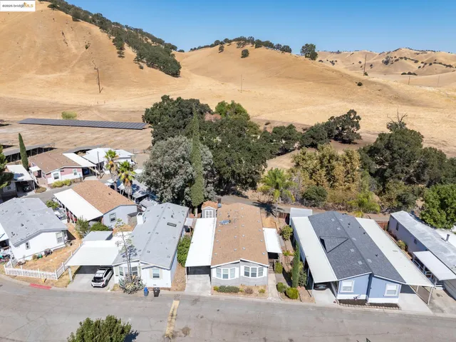 a view of a backyard of a house