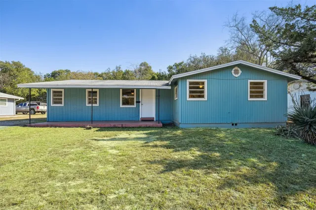 a view of outdoor space yard and garage