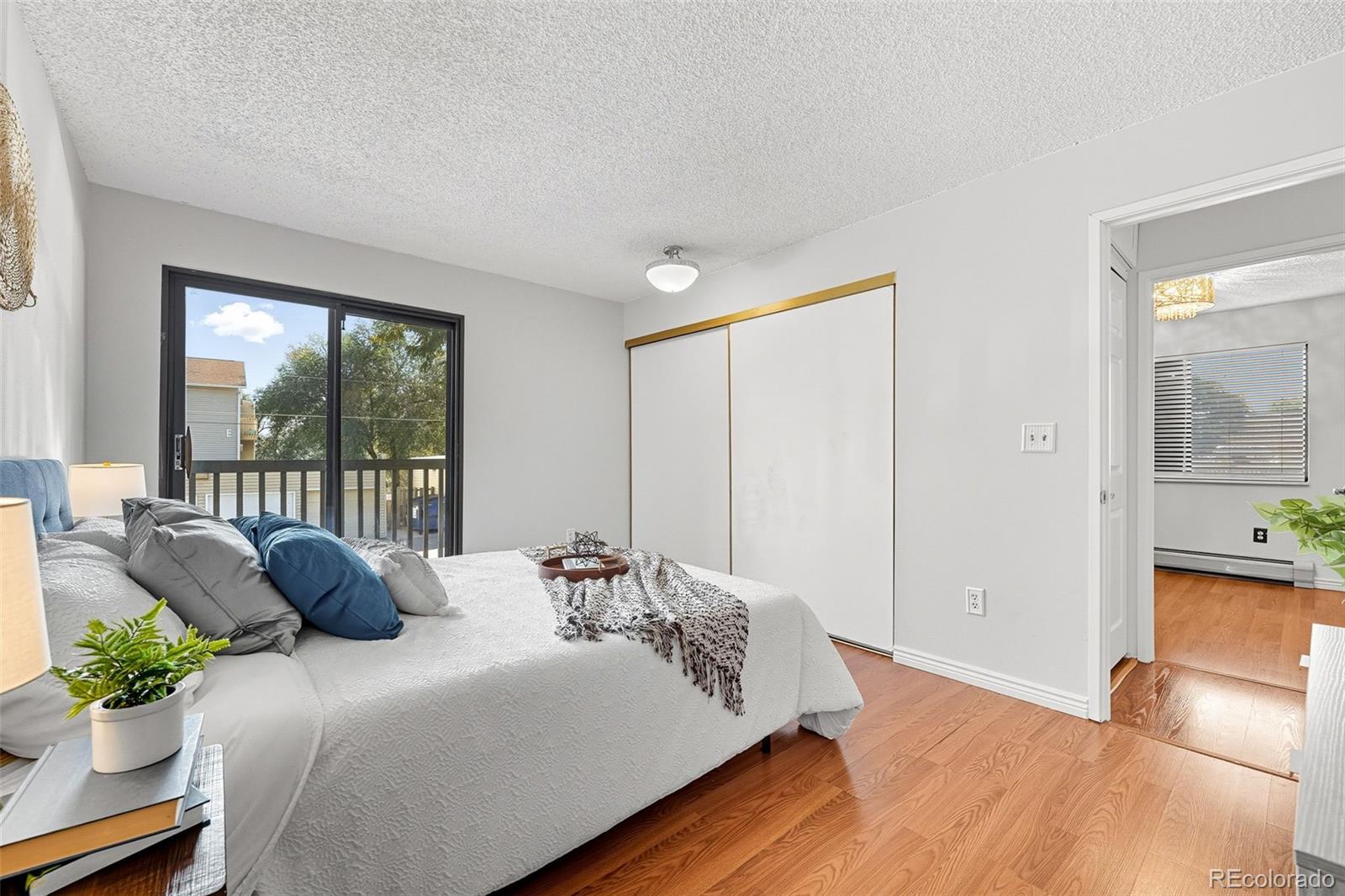 381 South Ames Street, Unit C204 Lakewood, CO 80226 - Photo 19 of 34 a living room with furniture and a large window