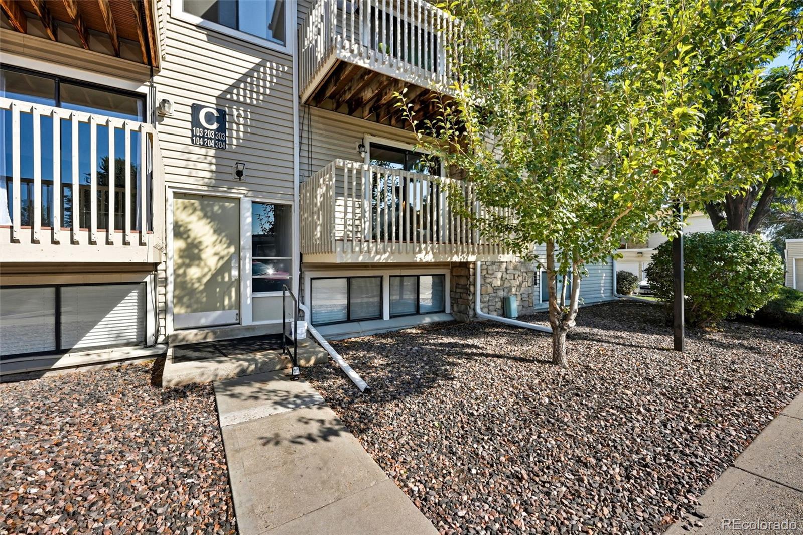 381 South Ames Street, Unit C204 Lakewood, CO 80226 - Photo 2 of 34 a front view of a house