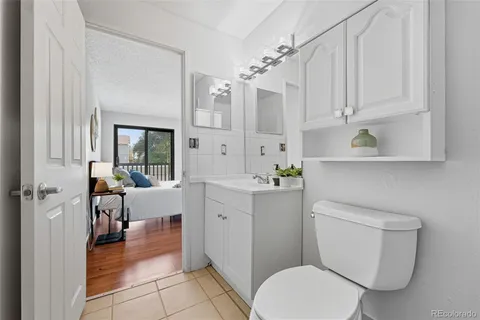 a bathroom with a sink a toilet and bathtub