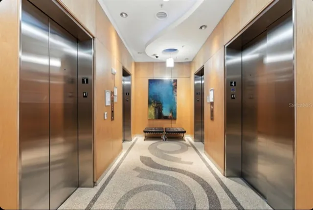 an aerial view of a house with a lake view