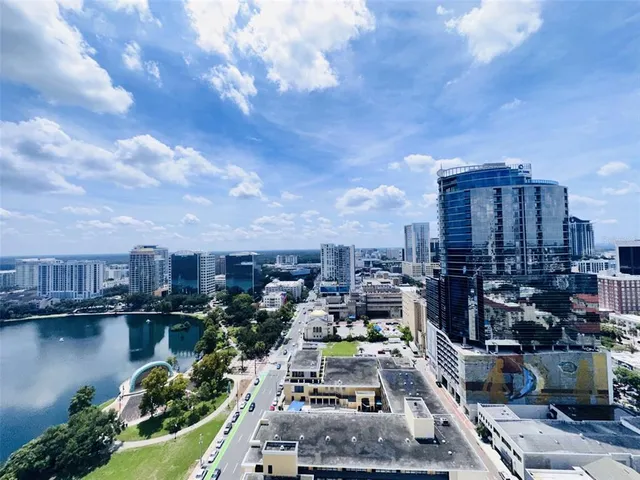 a view of a kitchen a sink and a refrigerator