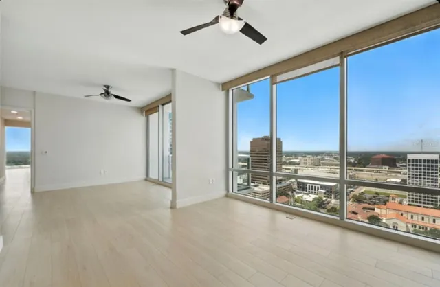 a kitchen with stainless steel appliances a sink and a refrigerator