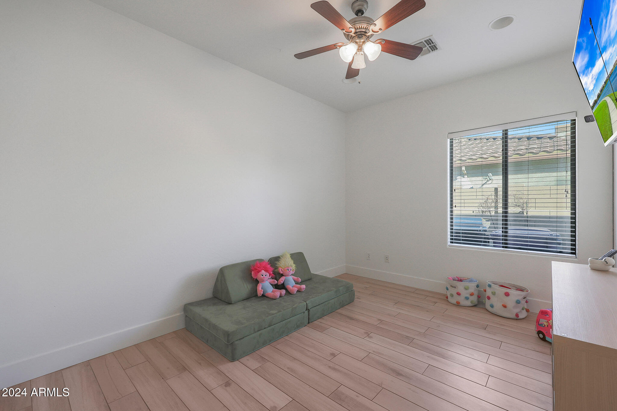 5220 West Beverly Road Laveen, AZ 85339 - Photo 28 of 49 a room with furniture and a window
